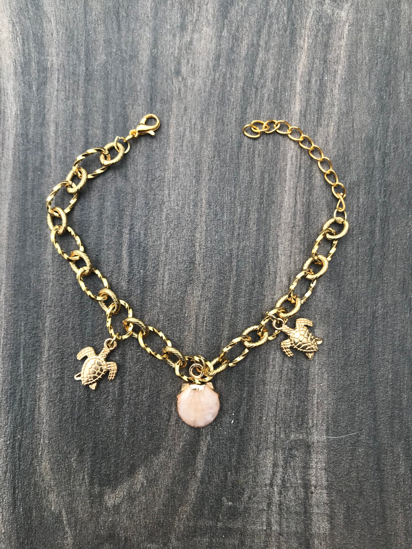 Pulsera Arrecife en acero inoxidable con conchas y tortugas | Joyas marinas exclusivas